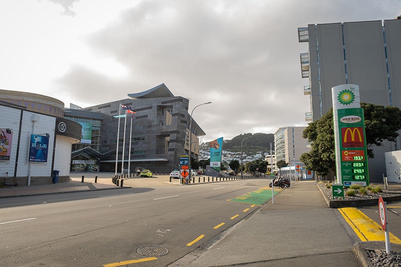 Wide shot of the entrance to Te Papa from Cable St showing the road you enter to drive into the car park