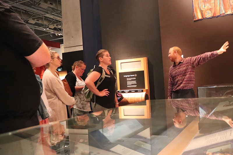 A member of Te Papa addresses a group of teachers inside the museum