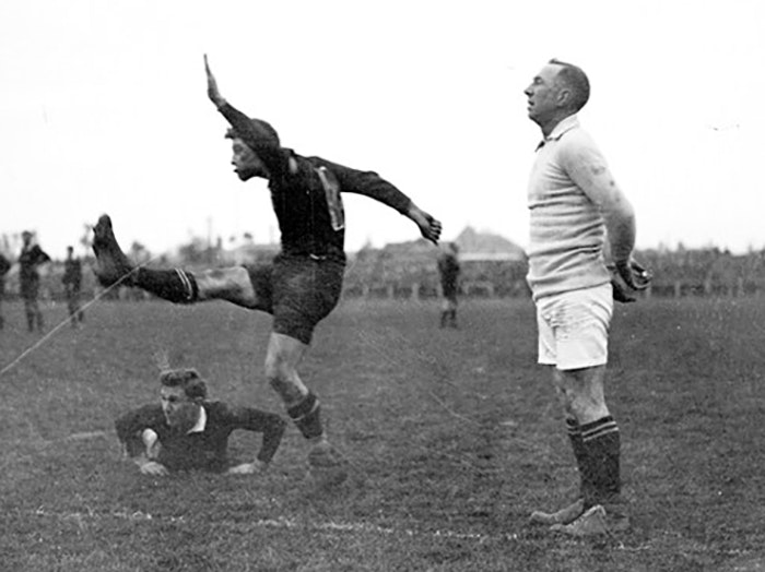 Rugby player kicking for goal, circa 1922