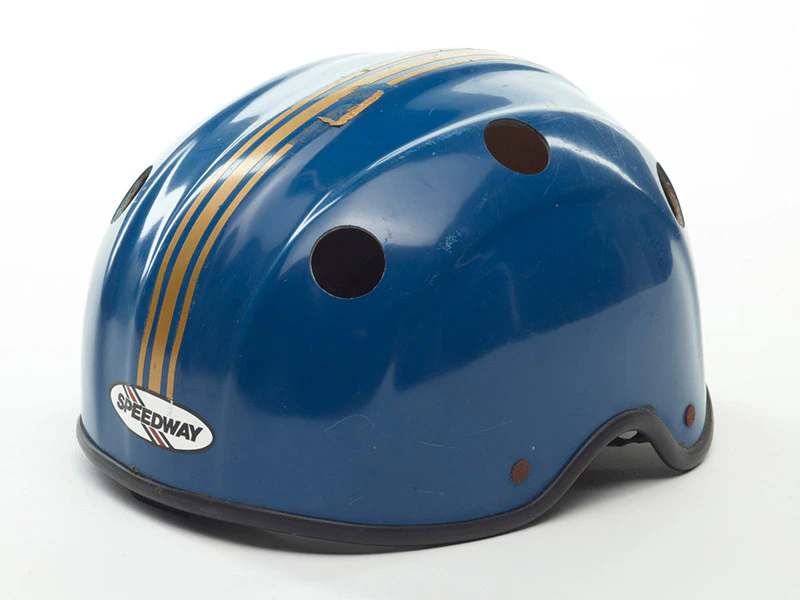 A blue helmet with gold stripes