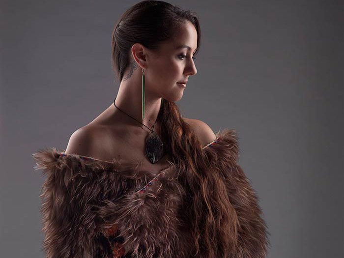 Atareta Sciascia wearing kahu kuri. Te Papa