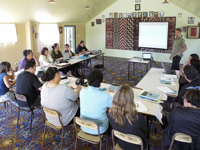 Te Papa photographer Michael Hall presenting at a workshop at Mateo Marae, 2013. Te Papa