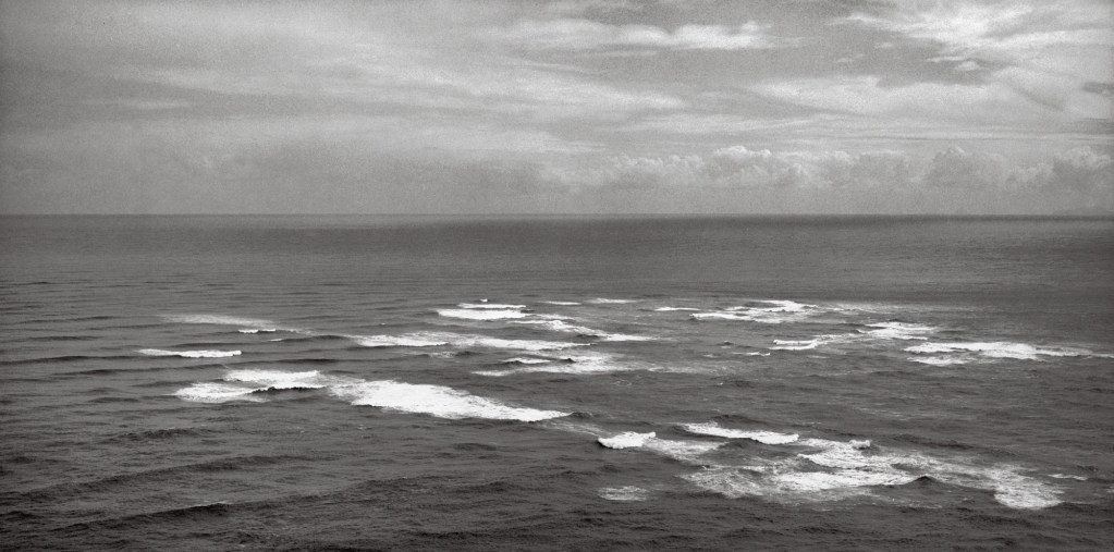 Black and white photograph of the sea