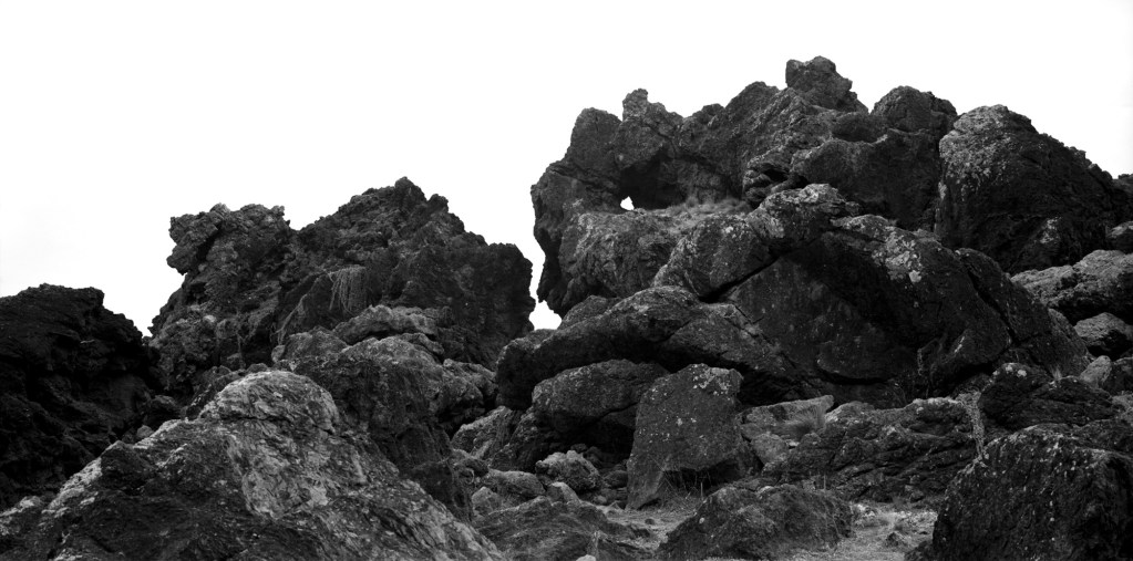Black and white photograph of rocks at Cape Palliser, Wairarapa