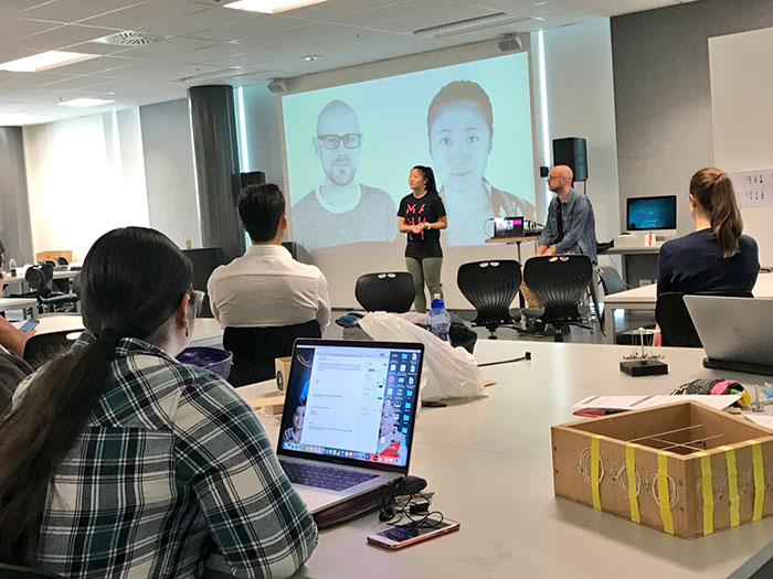 Students watch a presentation