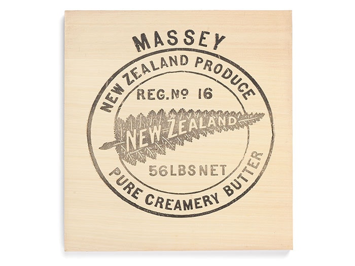 Butter box with a silver fern on it, and the words Massey New Zealand Produce Pure Creamery Butter