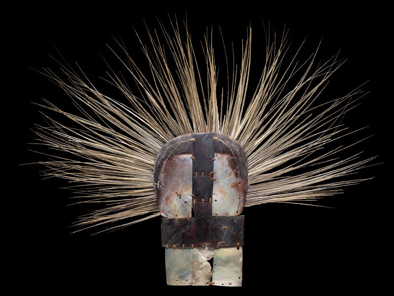 headdress made from feathers and shell