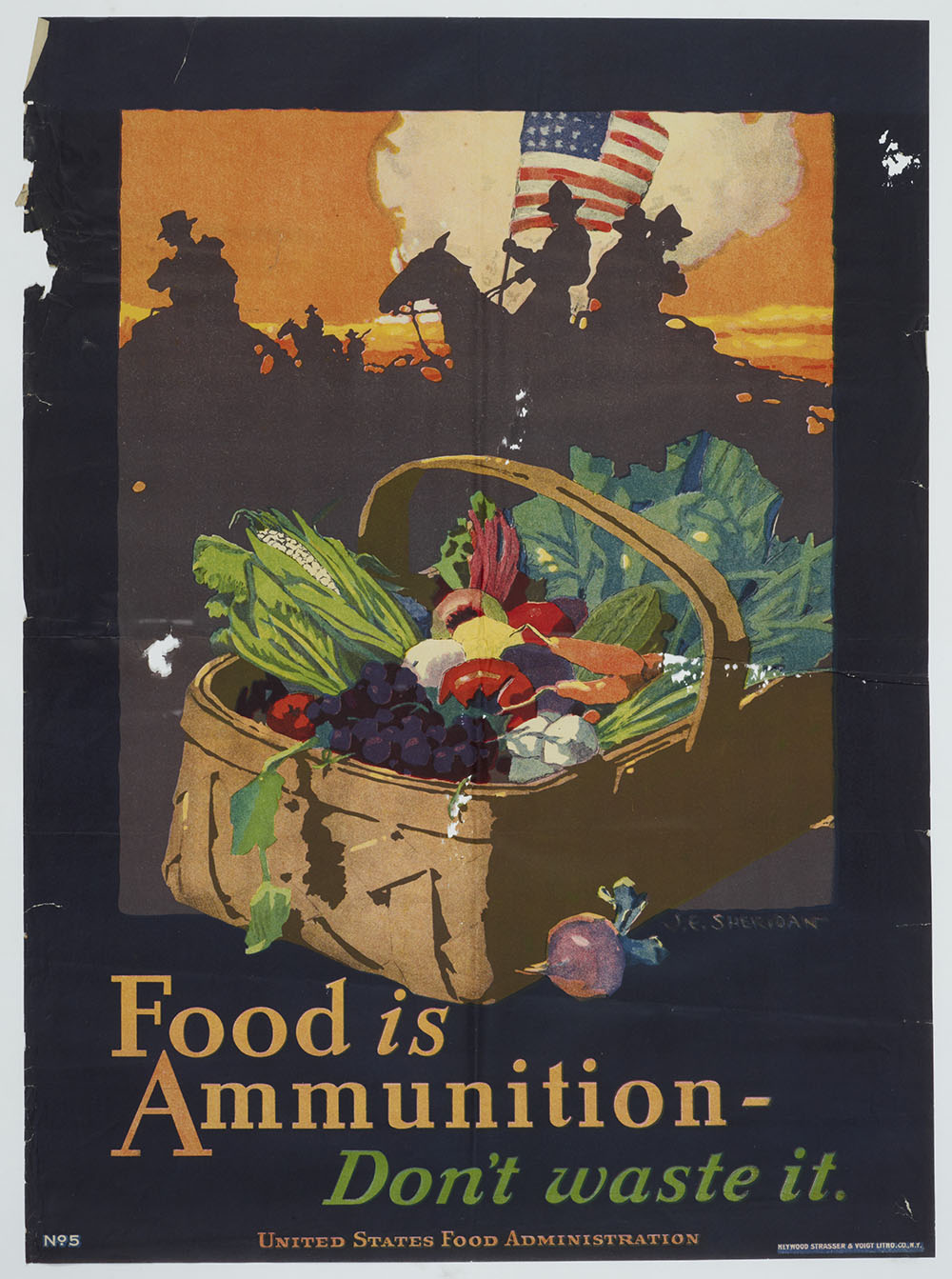 Poster featuring a basket of food and the words 'Food is ammunition - don't waste it'