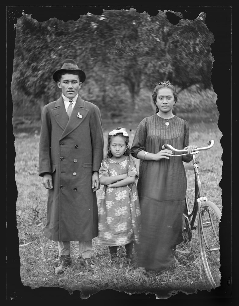 Family stand with a bike