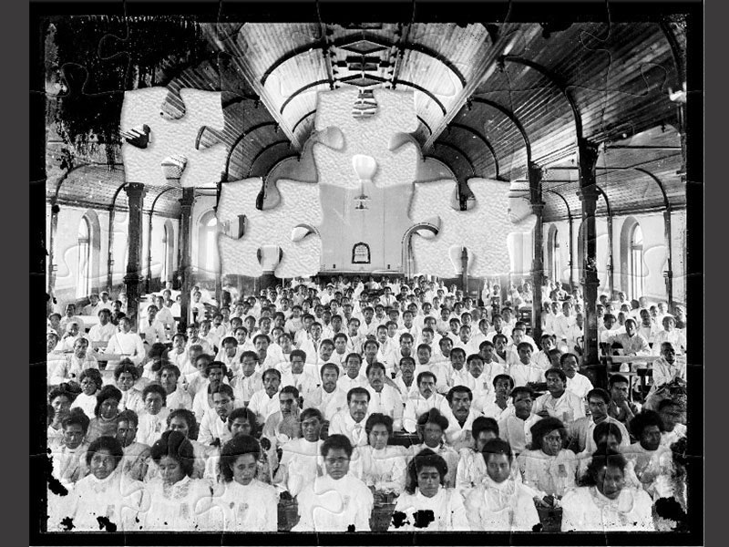 Church at Malua, late 1890s, Sāmoa, by Thomas Andrew. Te Papa (D.000674) Black and white photo of Sāmoan people dressed in white in a wooden church with high arches.