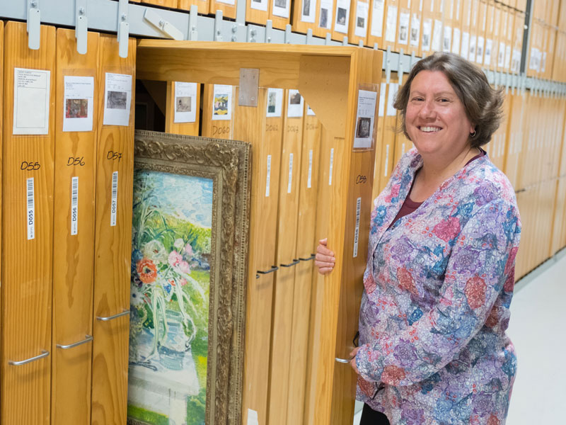 Anna Brookes in the art storerooms