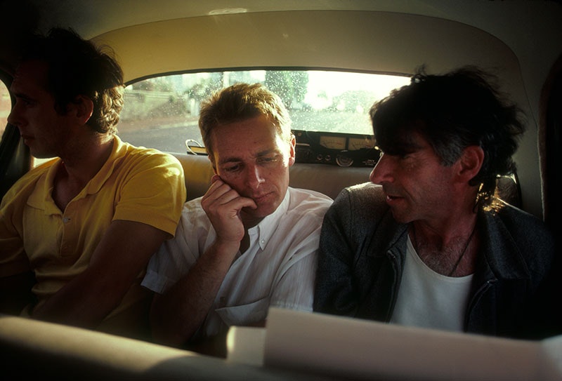 Chris Barrett, Martin Rumsby, and Tony Fomison in the back seat of a car