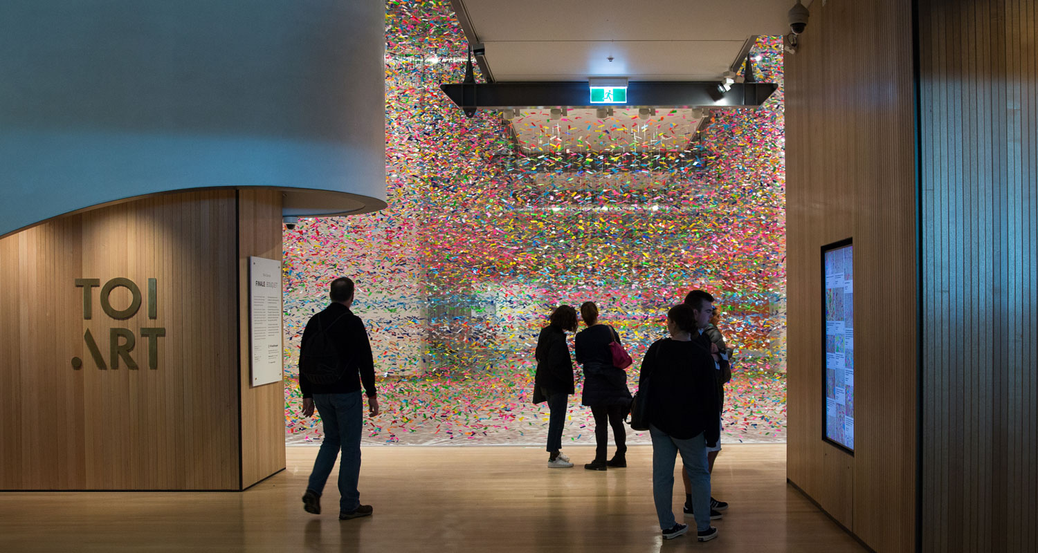 Visitors at the entrance to the art gallery