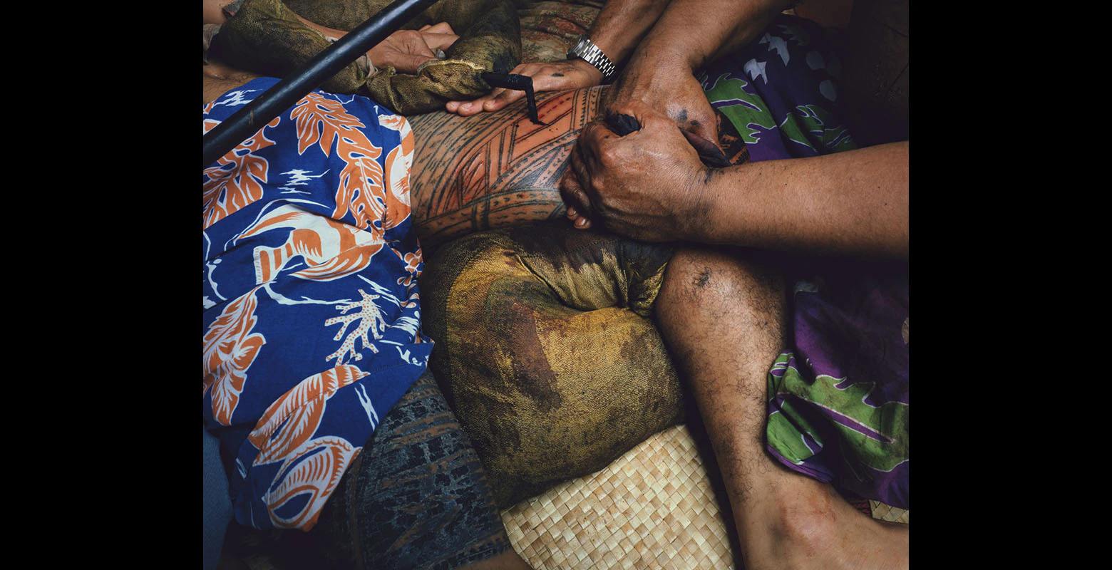 Close-up of a person getting a Samoan tattoo