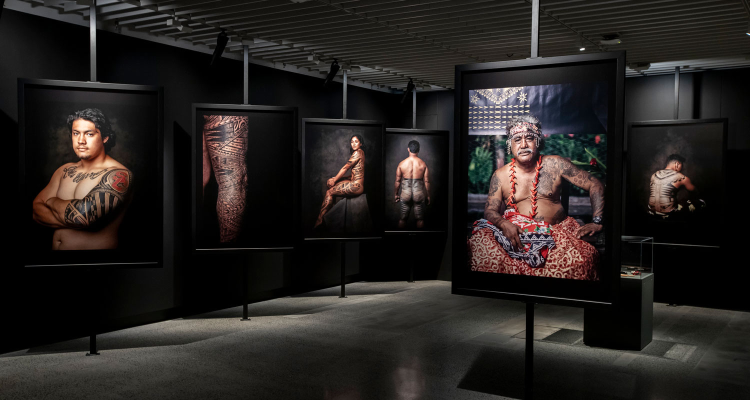 Large photos of people with tattoos on them