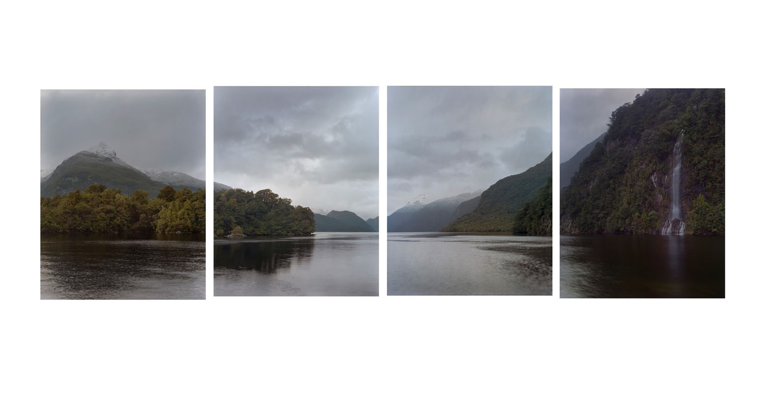 Four photos forming a panorama shows mountains to the left and right with a waterfall also on the right, and a snow-capped peak in the distance. It is an overcast day