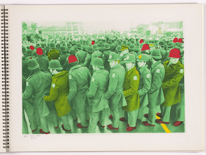 Screenprint of a photo of a large group of police. It has been coloured green, with the occasional red helmet and shoes