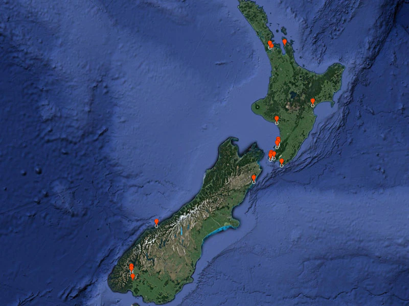 Map of New Zealand with red markers on it