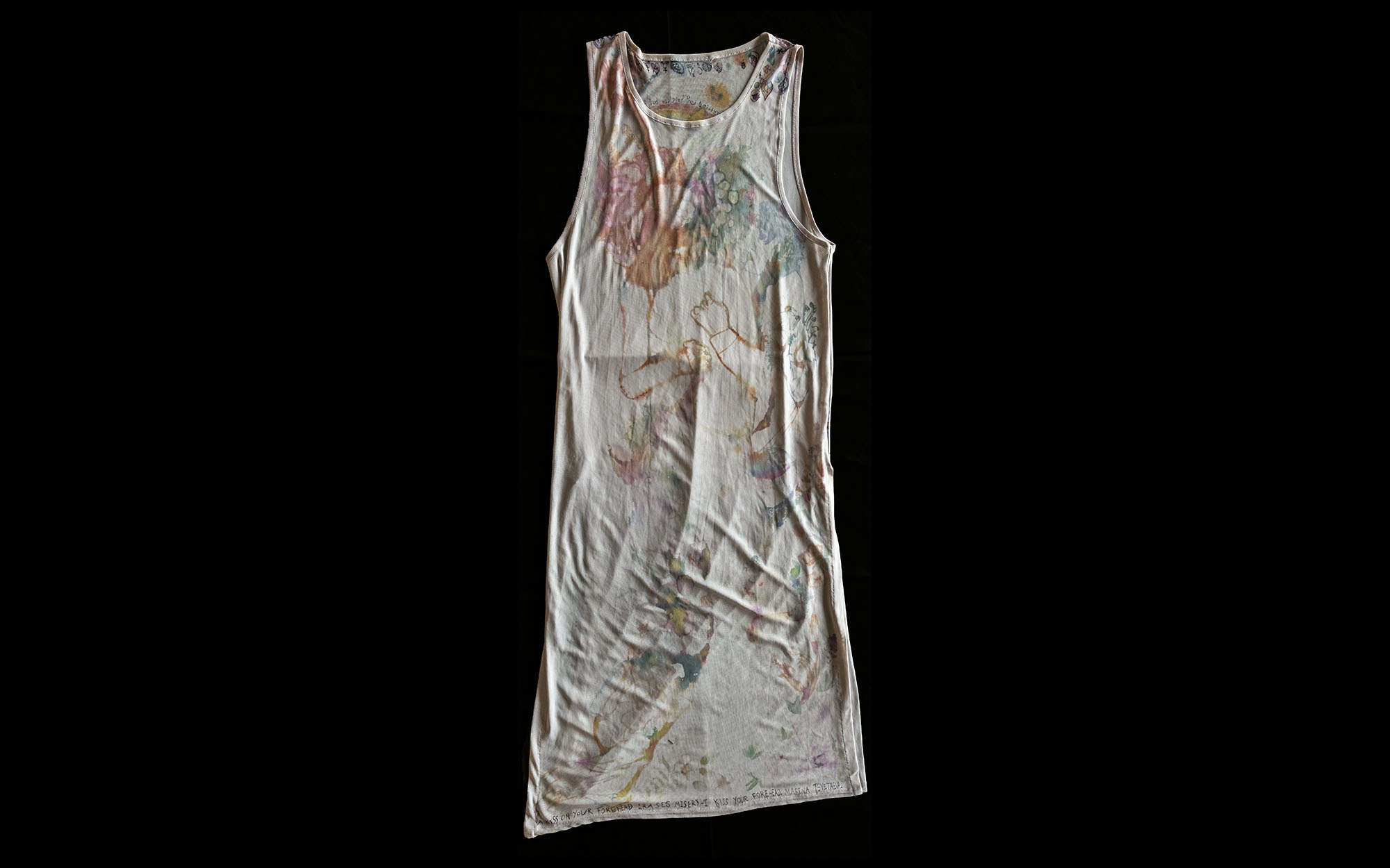 Dress with an array of colourful pictures drawn on it