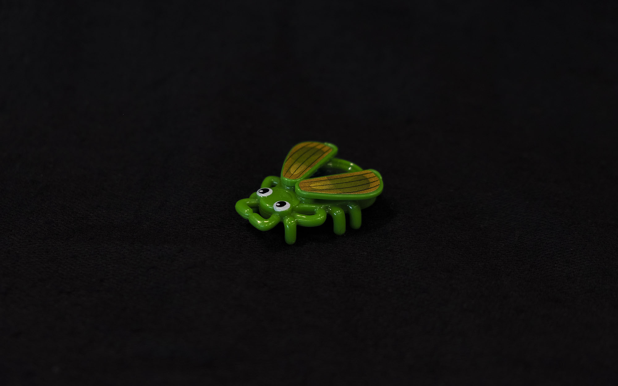 Green plastic bug