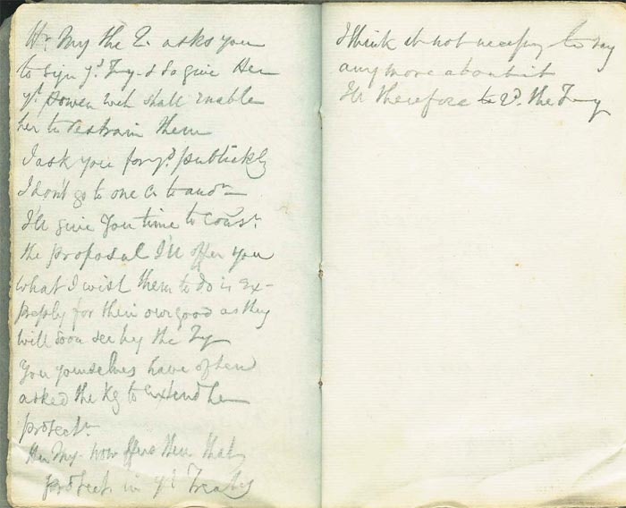 Open double-page spread of a notebook with handwritten notes