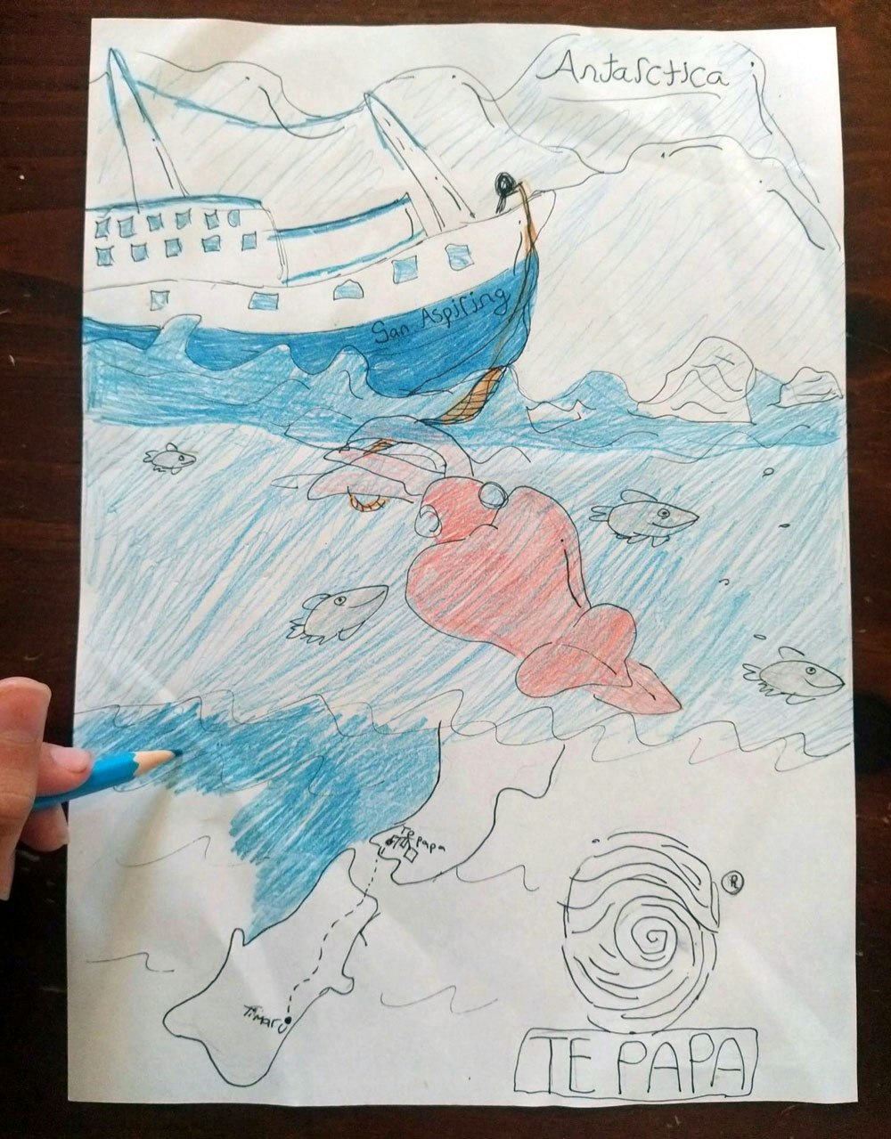 A drawing of the squid and a boat