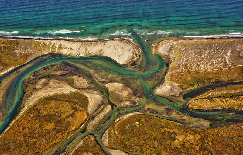 An aerial shot of a river mouth