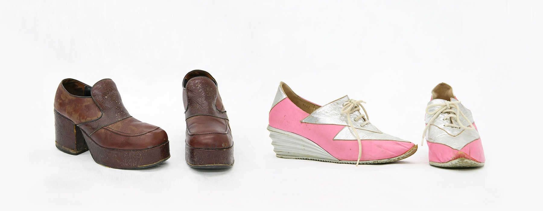 Two pairs of shoes from the 1970s, one brown pair and one pink and white pair