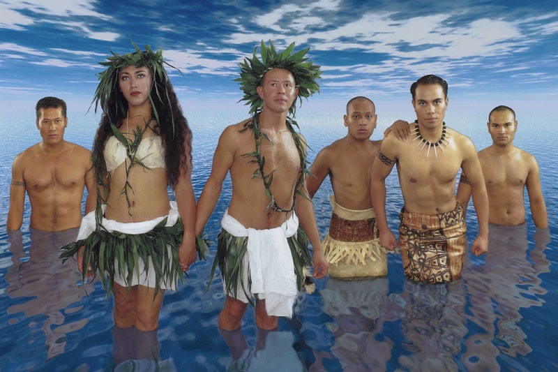 Crop from a poster featuring six people in traditonal Pacific clothing standing in a vast expanse of water with a vast skuy above them.