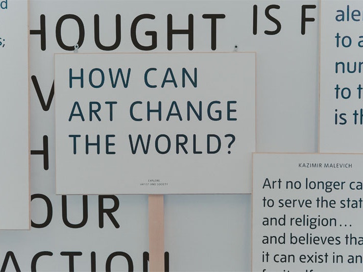 Photo by Toa Heftiba via Unsplash Question on paper, ‘How can Art change the world?’