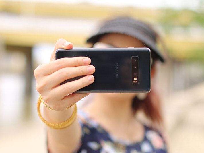 A woman taking a selfie. Photo by Cristina Zaragoza via Unsplash A woman taking a selfie