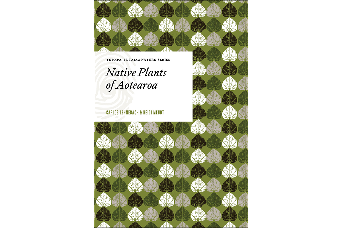 A book cover with stylised plants on it