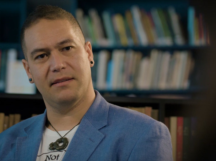 Still from Ngā Taonga Tuku Iho #1: Lost in the Colonisation Machine, 2022, by Pikihuia Haenga and Elise Lanigan. Image courtesy of Kahu Kutia Isaac Te Awa looks at the person interviewing him, who is behind the camera