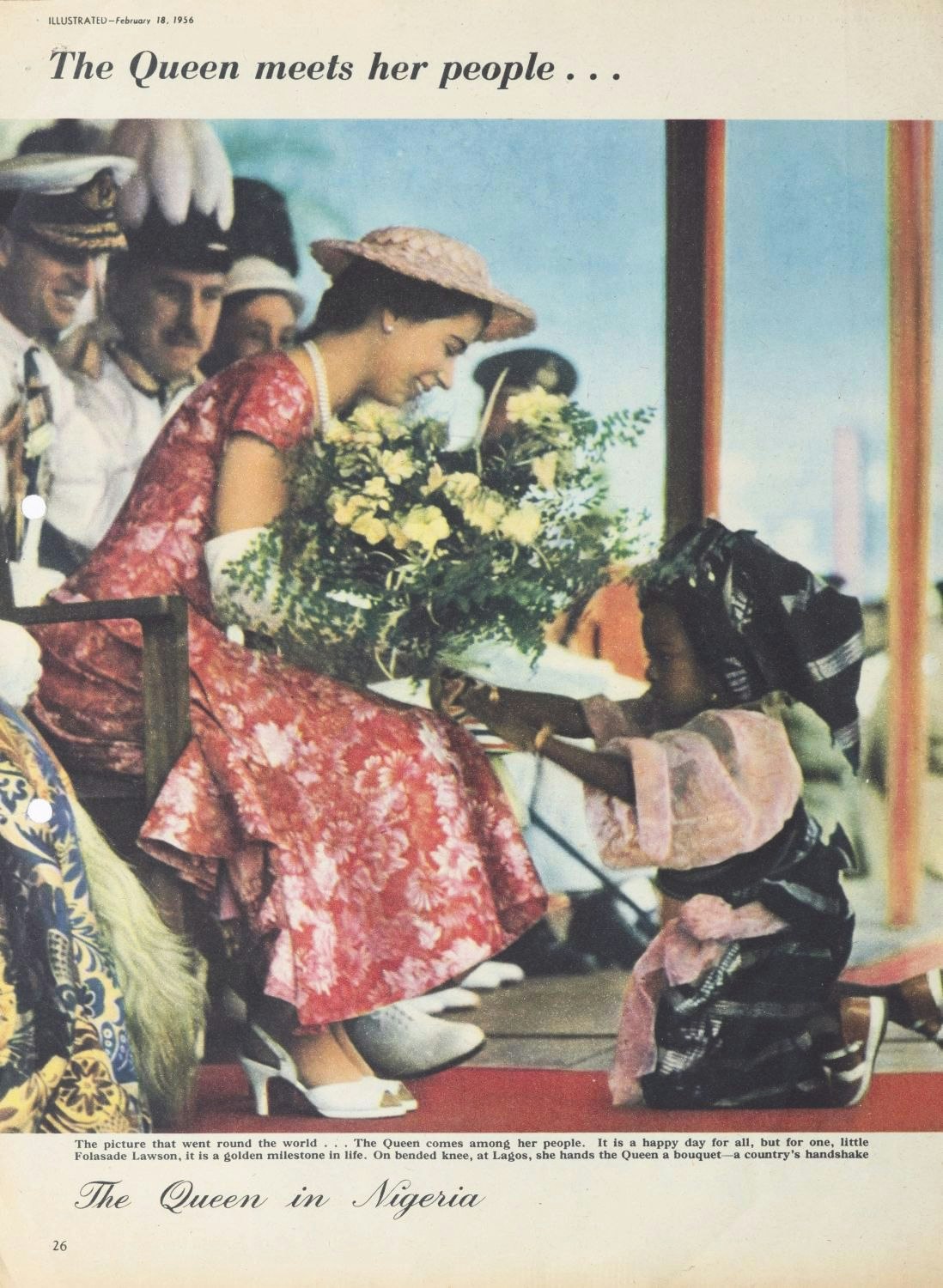 A seated woman in a pink dress and a hat is given a bunch of flowers by a young child in Niverian dreww