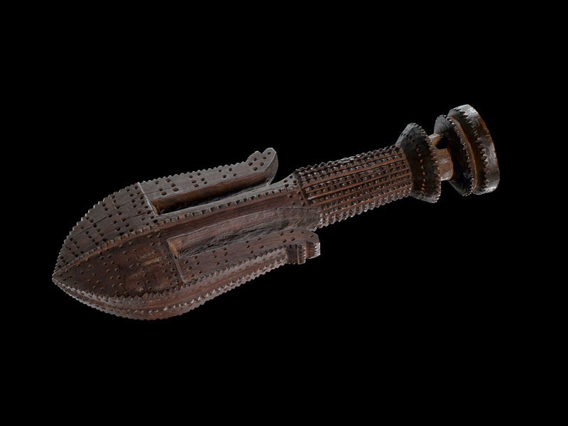 Food hook, 1700s, Tonga, maker unknown. Gift of Lord St Oswald, 1912. CC BY-NC-ND 4.0. Te Papa (FE000330) An ornately carved wooden hook