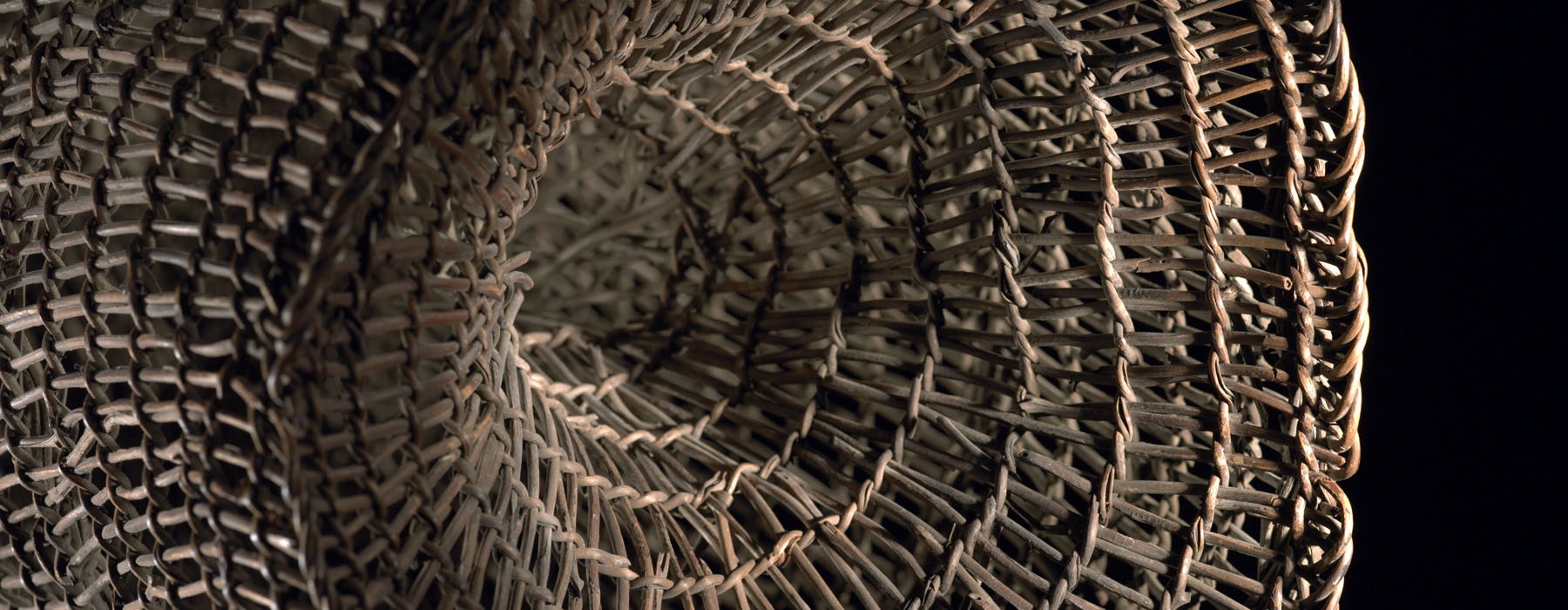 Close-up of a hīnaki (eel trap) showing its weavings