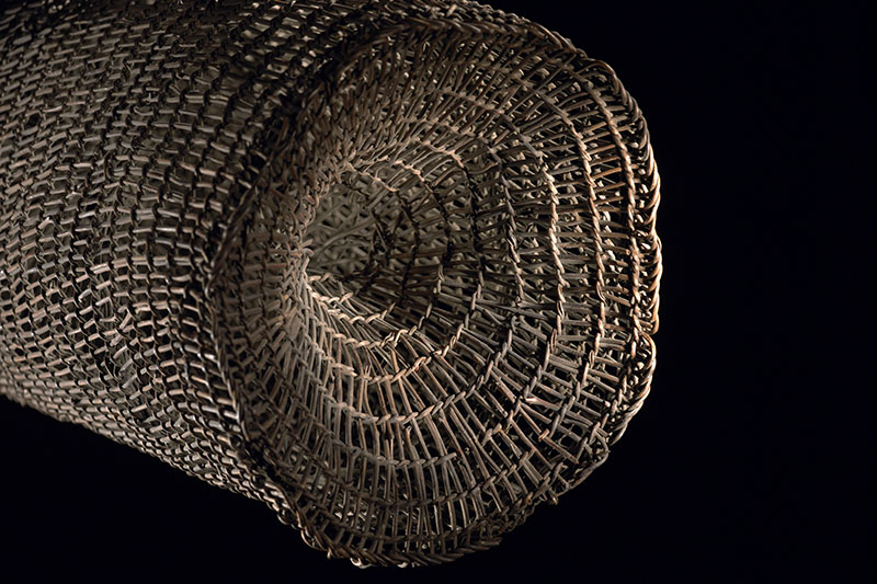 Close-up of a hīnaki (eel trap) showing its weavings