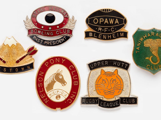 Selection of Trevor Dick badges from the collection. Te Papa A selection of 6 sports badges depicting, horseriding, bowls, rugby, rugby league