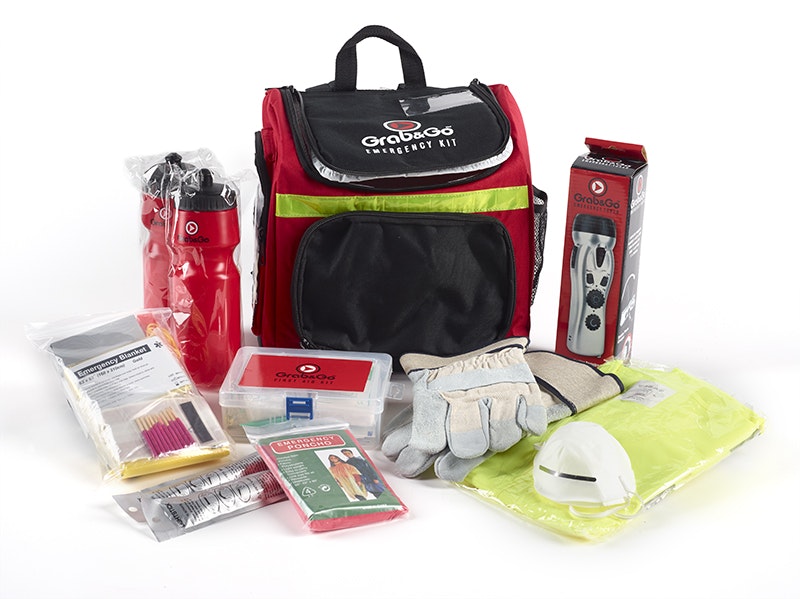 An emergency kit with the contents on display around the bag.