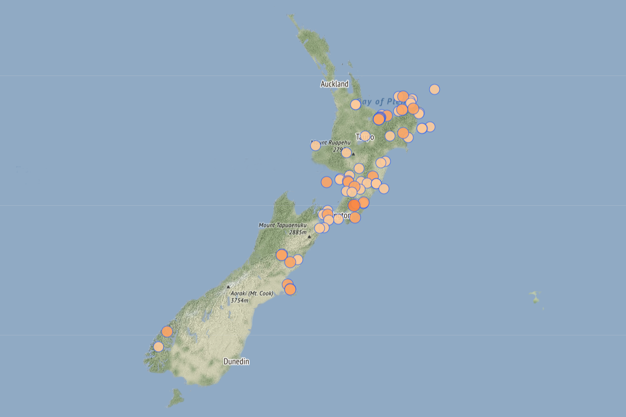 A map of New Zealand with orange-coloured dots on various parts of it to indicate where there have been recent earthquakes.