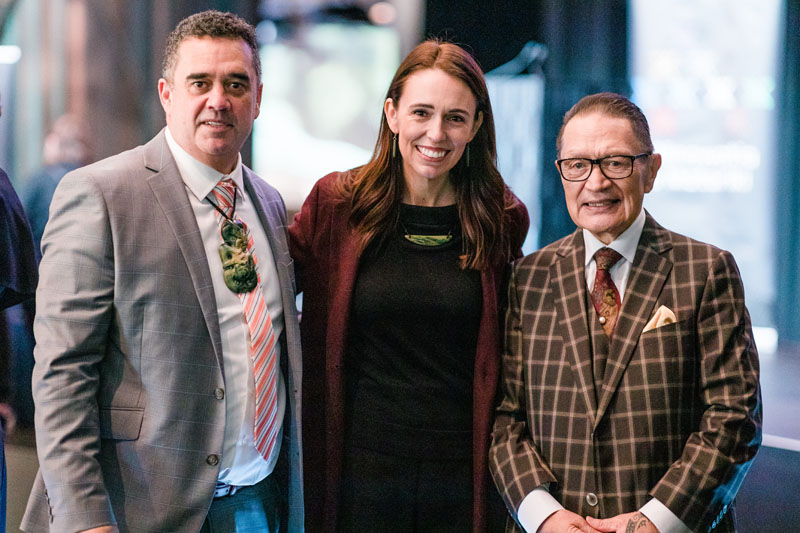 Rangi Matamua, then-Prime Minister Jacinda Ardern, and Sir Pou Temara pose for a group photo