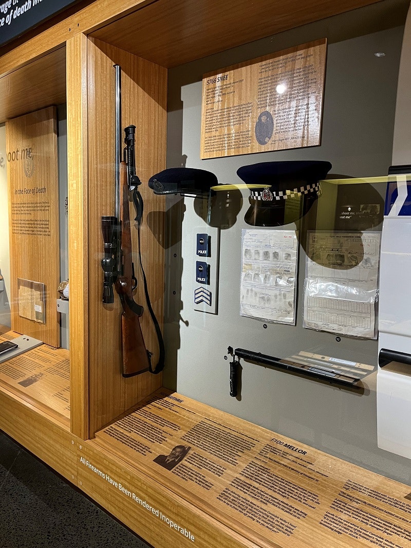 Picture of firearms on display in an exhibition setting