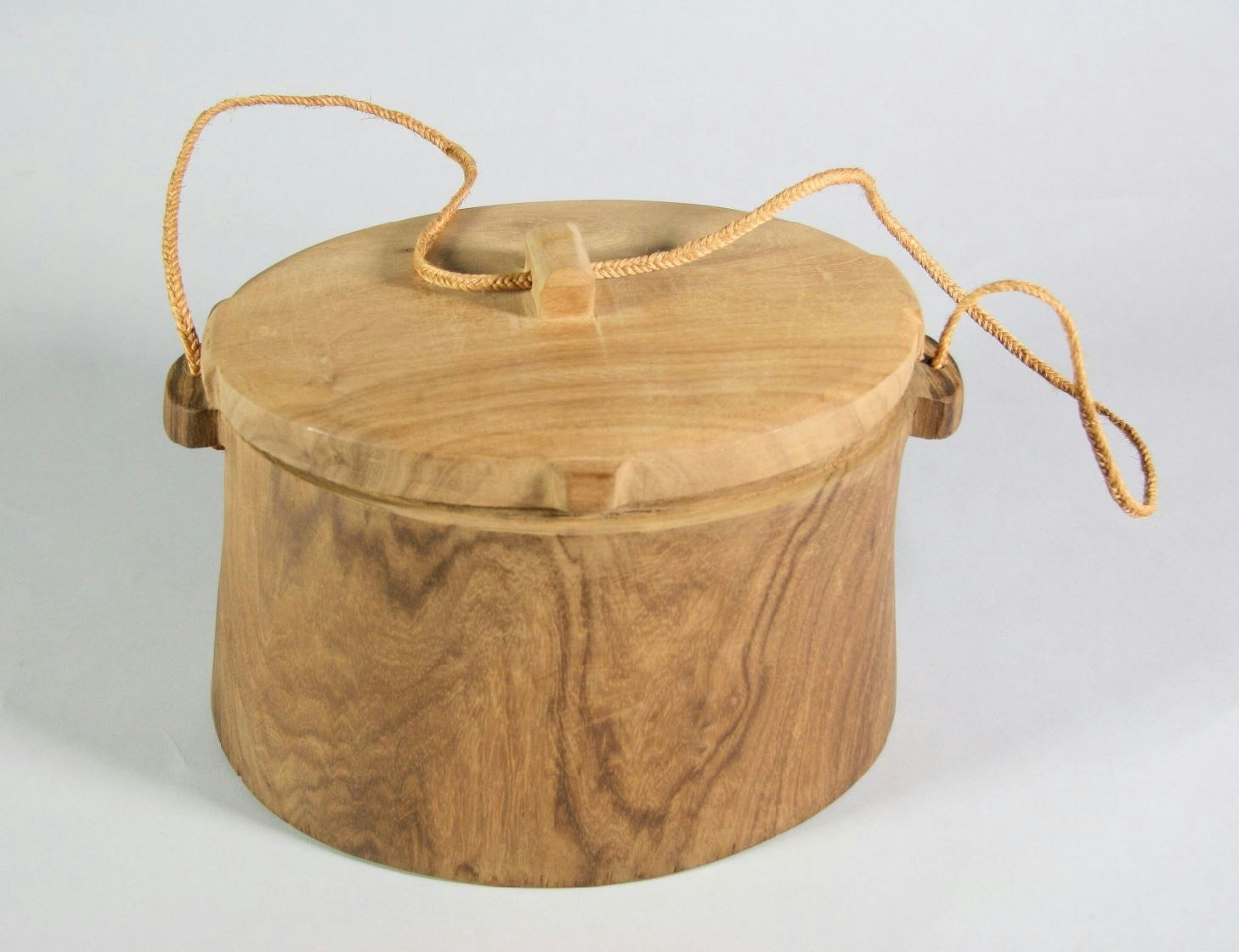Small wooden box with a string handle