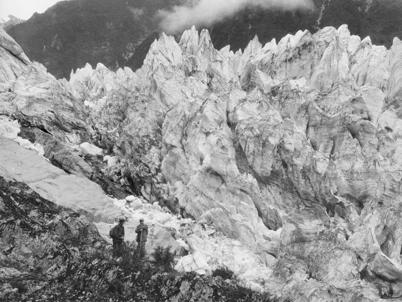 Glacier, 1925-1938, New Zealand, maker unknown. Te Papa (A.015023) Two men next to craggy ice