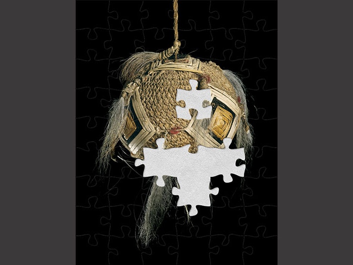 Poi awe (percussive device), 19th century, New Zealand, maker unknown. Te Papa (ME000150) Very rare poi woven in muka (flax fibre) with a technique called knotless netting. It is called a poi awe, due to the presence of the dog-hair awe (tassles) attached as decoration.