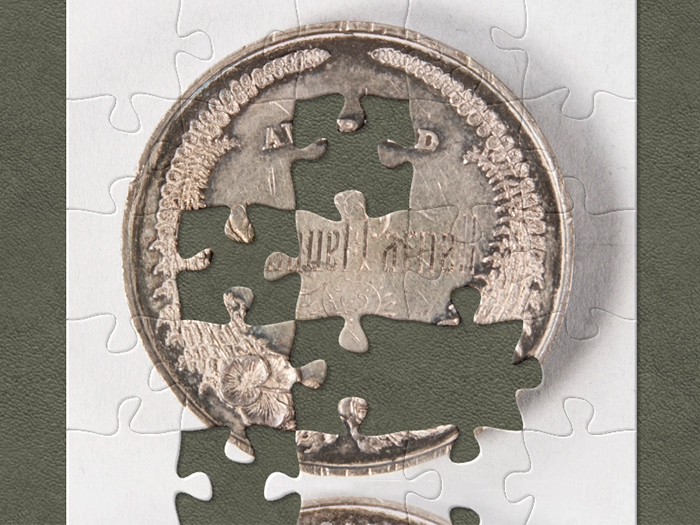 New Zealand Industrial Exhibition of Wellington medal(link is external), Siegfried Kohn; maker/artist; 1885; New Zealand. Te Papa (NU006842) An image of a coin as a jigsaw