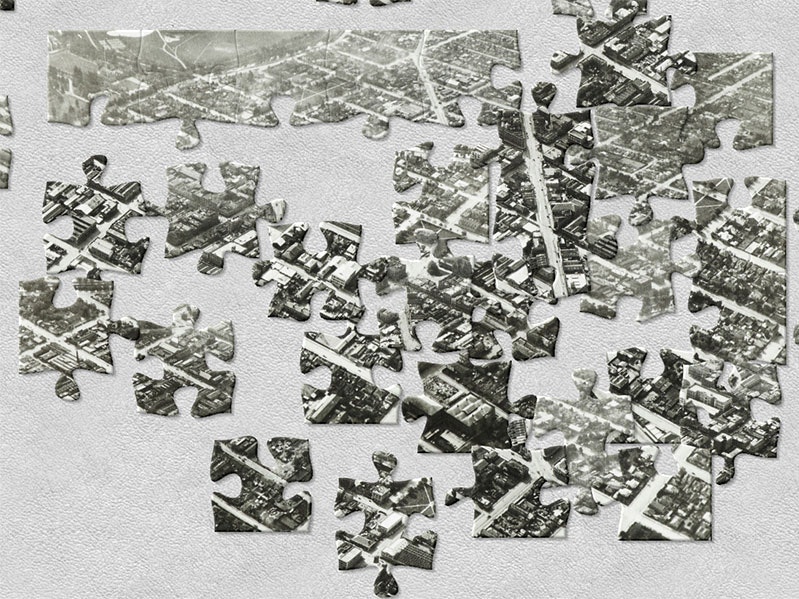 Where is this? Digital photo that has been cut up, digitally, into jigsaw pieces, and scattered