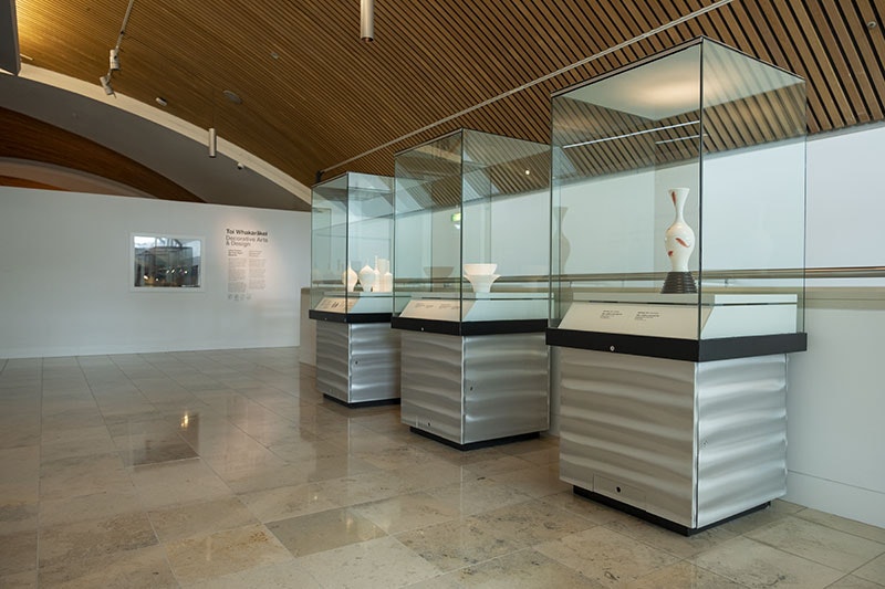 View of the John Parker exhibition, showing three glass plinths containing sculptures