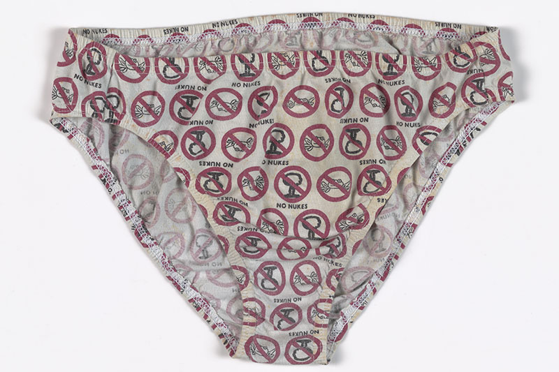 Pair of white underpants, covered in anti-nuclear symbols