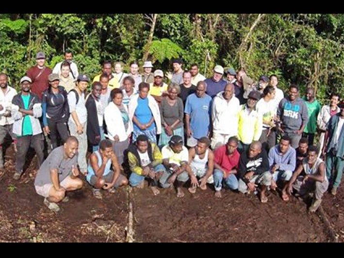 The team at the main field camp at Valevahalo. Photo by Patrick Pikacha, used with permission. A large group of people arranged for a group photo